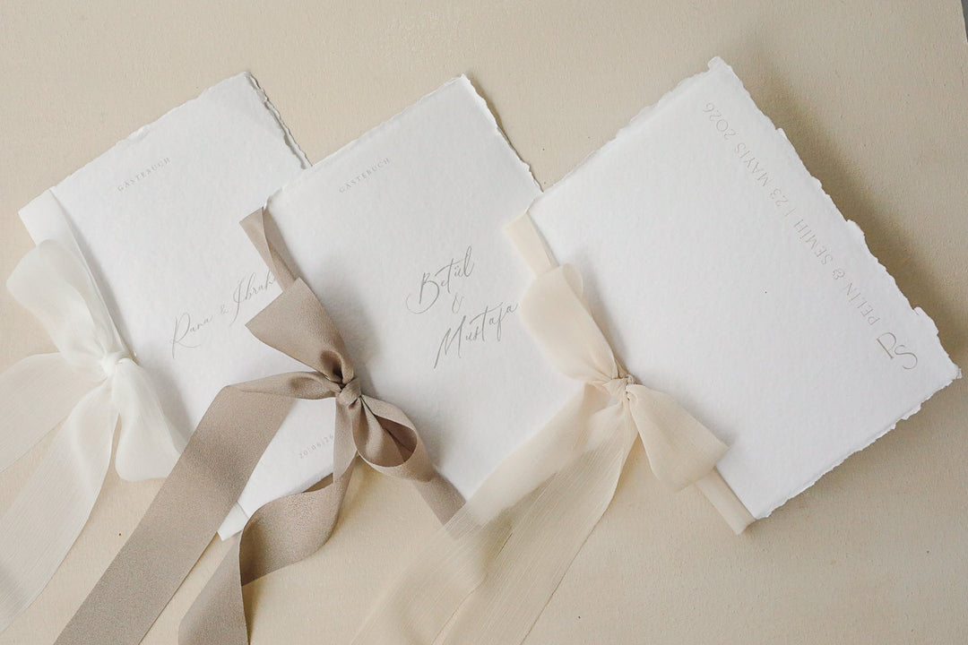 Büttenpapier Gästebuch personalisiert & Handgeschöpft inklusive Schleife Hochzeitseinladung.de