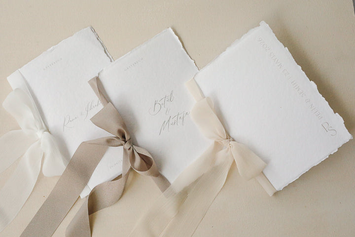 Büttenpapier Gästebuch personalisiert & Handgeschöpft inklusive Schleife Hochzeitseinladung.de